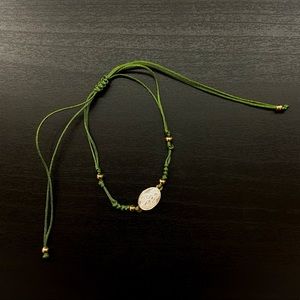 Boutique Gold Mary Pendant Pull String Bracelet